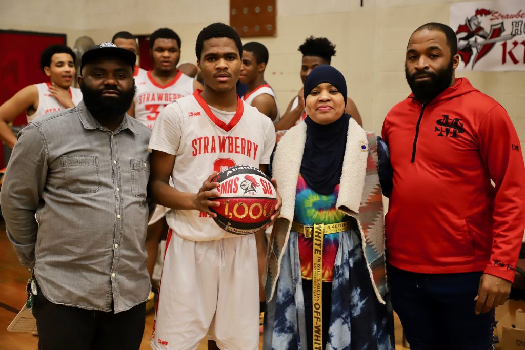 The Mansion community was excited to celebrate scholar Mustapha Abdullah's 1,000 career points during a halftime ceremony.